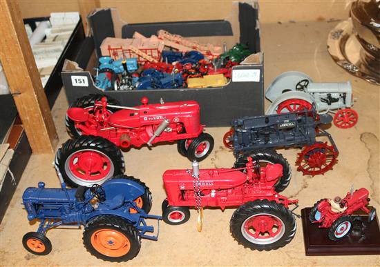 Quantity of metal tractors